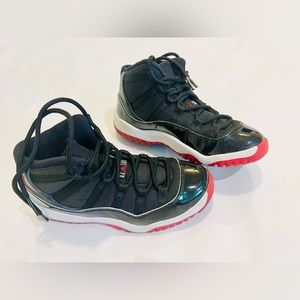 Jordan 11 Retro black true red and white